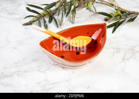 colorful handmade ceramic bowl on marble table Stock Photo