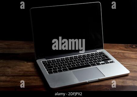 Cracow, Poland. 01st Dec, 2020. A 13inch Macbook pro seen displayed on a wooden desk. Credit: SOPA Images Limited/Alamy Live News Stock Photo