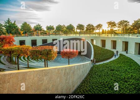 11-13-2020 A peculiar amphitheater with red Texas oaks - part of the Krasnodar park. People  walking Stock Photo