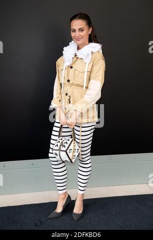 Alicia Vikander attends the Louis Vuitton Fall/Winter 2023-2024  ready-to-wear collection presented Monday, March 6, 2023 in Paris. (Vianney  Le Caer/Invision/AP Stock Photo - Alamy
