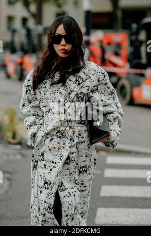 Street style, Xiayan Guo arriving at Hermes Spring Summer 2021 show