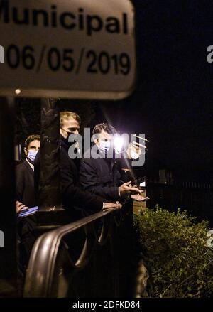 French President Emmanuel Macron with Eric Ciotti and Christian Estrosi in Saint-Martin-Vesubie on October 8, 2020, during a visit in the Alpes-Maritimes departement where storms and extensive flooding caused widespread damage. Intense flooding hammered southeast France over the weekend of October 2, causing four confirmed deaths in France and two in Italy, with the toll expected to rise further as searches continue for survivors. Hundreds of people have been evacuated after storms dumped huge amounts of rain that turned streams into churning torrents that swept away cars, houses and bridges i Stock Photo