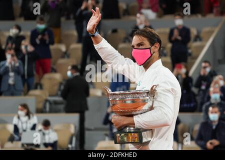 Rafael Nadal of Spain celebrates with the winners trophy after his victory against Novak Djokovic of Serbia in the Singles Final on Court Philippe-Chatrier during the French Tennis Open at Roland Garros Stadium on October 11, 2020 in Paris, France. Photo by Laurent Zabulon/ABACAPRESS.COM Stock Photo