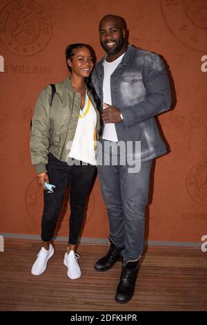 Teddy Riner and his wife Luthna Plocus attend the French Open at Roland Garros stadium on October 11, 2020 in Paris, France. Photo by Laurent Zabulon/ABACAPRESS.COM Stock Photo