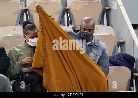 Teddy Riner and his wife Luthna Plocus attend the French Open at Roland Garros stadium on October 11, 2020 in Paris, France. Photo by Laurent Zabulon/ABACAPRESS.COM Stock Photo