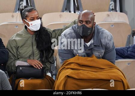 Teddy Riner and his wife Luthna Plocus attend the French Open at Roland Garros stadium on October 11, 2020 in Paris, France. Photo by Laurent Zabulon/ABACAPRESS.COM Stock Photo