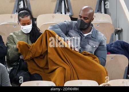 Teddy Riner and his wife Luthna Plocus attend the French Open at Roland Garros stadium on October 11, 2020 in Paris, France. Photo by Laurent Zabulon/ABACAPRESS.COM Stock Photo