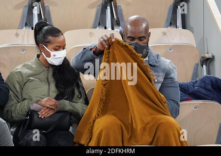 Teddy Riner and his wife Luthna Plocus attend the French Open at Roland Garros stadium on October 11, 2020 in Paris, France. Photo by Laurent Zabulon/ABACAPRESS.COM Stock Photo