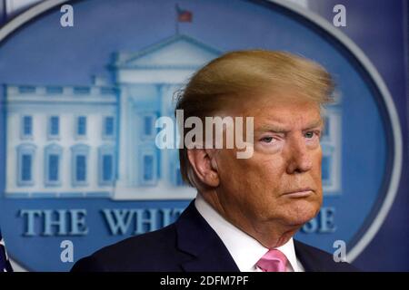 File photo - U.S. President Donald Trump stands during a news conference with members of the Coronavirus Task Force at the White House in Washington on February 26, 2020. Trump made an ultra rare appearance in James S. Brady Briefing Room at the White House. Donald Trump has privately confided that he fears he will face multiple prosecutions if he loses the presidential election. The President of the United States has told aides he expects the chances of criminal charges against him to dramatically increase if he loses to Joe Biden on November 3. According to The New York Times, Trump is worri Stock Photo