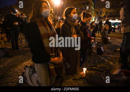 Catholic Mass in the street organised by ‘Pour la Messe’ to protest the closing of churches during COVID-19 lockdown, facing Saint Sulpice church, in Paris, France, on November 22, 2020. Photo by Ammar Abd Rabbo/ABACAPRESS.COM Stock Photo