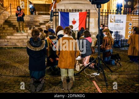 Catholic Mass in the street organised by ‘Pour la Messe’ to protest the closing of churches during COVID-19 lockdown, facing Saint Sulpice church, in Paris, France, on November 22, 2020. Photo by Ammar Abd Rabbo/ABACAPRESS.COM Stock Photo