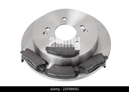 set of brake pads and brake disc new car spare parts brakes for a vehicle close up view isolated on a white background, nobody. Stock Photo