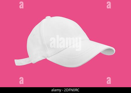 Profile view of white sport cap mockup with copy space isolated on pink background Stock Photo