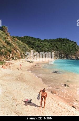 1990s St. Barts (Saint Barthélemy) – Visitors relax and play on the Anse des Grands Galets (Big Shell Beach) ca. 1998 Stock Photo