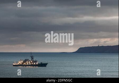 Kinsale, Cork, Ireland. 05th December, 2020. Naval vessel  LÉ Samuel Beckett at anchor at dusk on a winter's afternoon in Kinsale Harbour, Co. Cork, Ireland. -Credit; David Creedon / Alamy Live News Stock Photo
