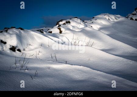 Snow Formations against a wall in the Yorkshire Dales Stock Photo