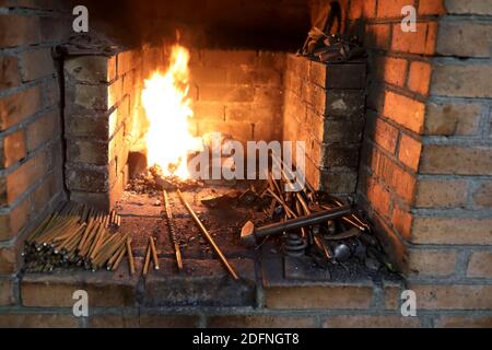 View of Blacksmithing Tools in the forge Stock Photo