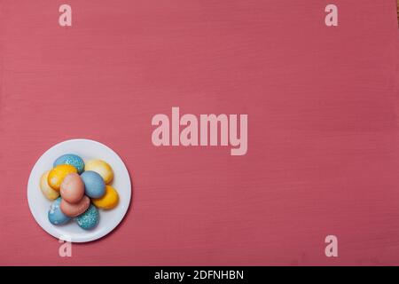 multi-colored chicken eggs for the Easter holiday as a backdrop Stock Photo