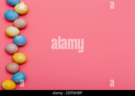 multi-colored chicken eggs for the Easter holiday as a backdrop Stock Photo