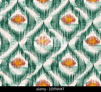 Vintage  seamless pattern in ikat style. Retro ikat green pattern with peacock feathers. Stock Photo