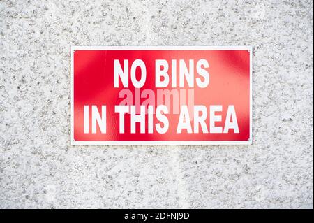 No bins allowed in this area red sign Stock Photo