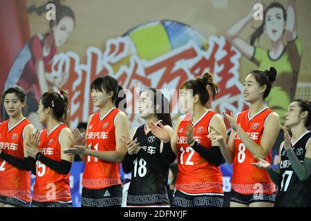 Jiangmen, China's Guangdong Province. 6th Dec, 2020. Players of Beijing team line up during the Group D match between Shandong team and Beijing team at the third stage of the 2020-2021 season Chinese Women's Volleyball Super League in Jiangmen, south China's Guangdong Province, Dec. 6, 2020. Credit: Liu Dawei/Xinhua/Alamy Live News Stock Photo