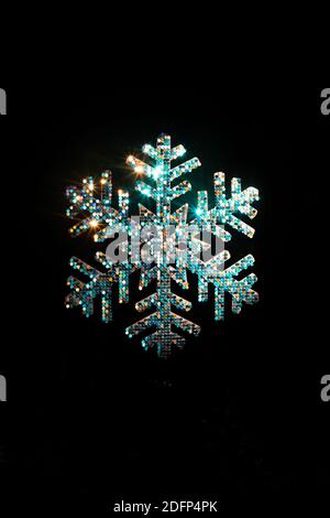 Illuminated snowflake on the Blenheim Christmas lights trail. Stock Photo