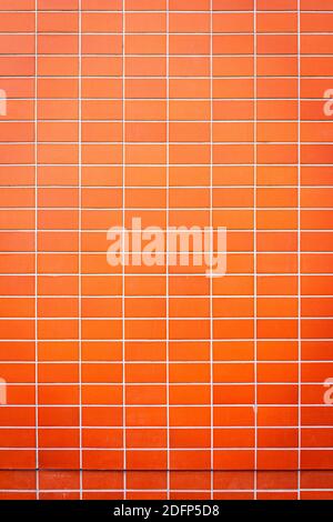 Modern weathered red tile wall texture background Stock Photo