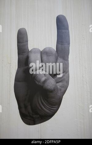Devil hand sign gesture Stock Photo - Alamy