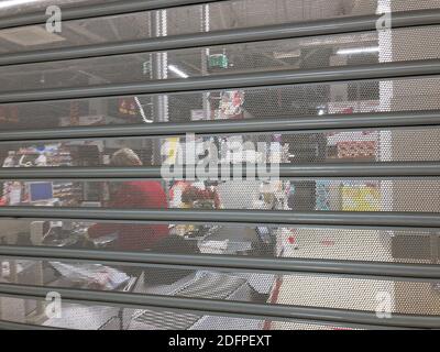 cash audit behind closed blinds Stock Photo