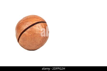 Macadamia nut in a shell on an empty white background subtext Stock Photo