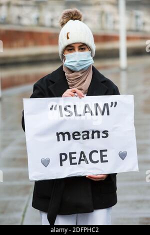 Bristol, UK. 6th Dec 2020. Anti- Islamophobia protesters march through Bristol city centre demanding more protection for Muslims. They condemned the French government’s actions towards Muslims and highlighted the case of Shukri Abdi who drowned in near Manchester, which they do not believe was an accident. Redorbital/Alamy Live News Stock Photo