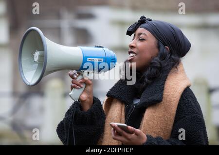 Bristol, UK. 6th Dec 2020. Anti- Islamophobia protesters march through Bristol city centre demanding more protection for Muslims. They condemned the French government’s actions towards Muslims and highlighted the case of Shukri Abdi who drowned in near Manchester, which they do not believe was an accident. Redorbital/Alamy Live News Stock Photo