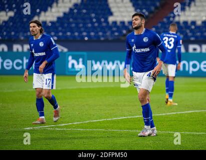 Gelsenkirchen, Germany. 06th Dec, 2020. Football: Bundesliga, FC Schalke 04 - Bayer Leverkusen, 10th matchday at the Veltins Arena. Schalke's Ozan Kabak (r) and Schalke's Benjamin Stambouli are on the pitch. Credit: Guido Kirchner/dpa - IMPORTANT NOTE: In accordance with the regulations of the DFL Deutsche Fußball Liga and the DFB Deutscher Fußball-Bund, it is prohibited to exploit or have exploited in the stadium and/or from the game taken photographs in the form of sequence images and/or video-like photo series./dpa/Alamy Live News Stock Photo