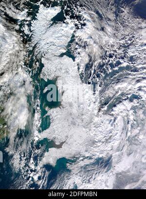 BRITISH ISLES -- 07 January 2010 - This NASA satellite image shows the United Kingdom of Great Britain and Northern Ireland almost entirely blanketed Stock Photo