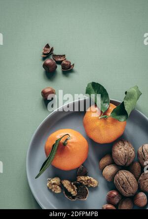 Easy peelers ,Clementine's and mixed nuts Stock Photo