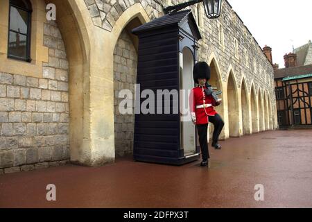 British Royal Guard outside Guard Room at Windsor Castle. Windsor, Berkshire, England, UK. Stock Photo