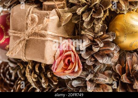Homemade Christmas tree made of cones, Christmas toys and gifts - decoration for Christmas Stock Photo