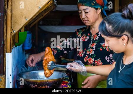 Boorsok is a Kyrgyz street food snack in Osh, Kyrgyzstan Stock Photo