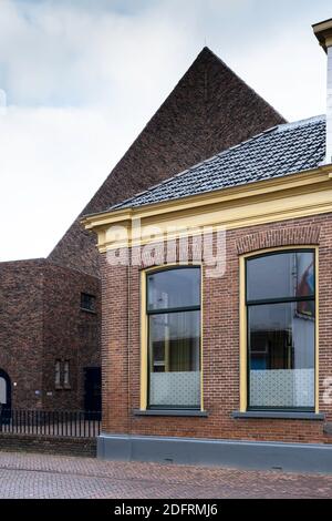 Reformed church of Appingedam with adjoining rectory, the rectory dates from 1879 and has neoclassical features Stock Photo