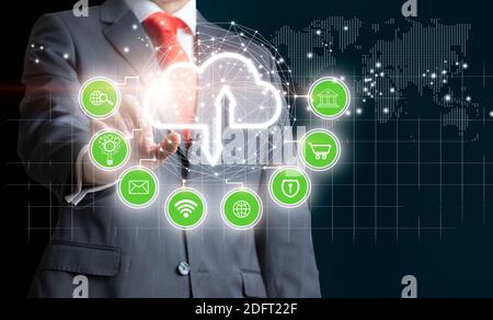 Businessman touching the cloud icon as a Cloud computing, Technology connectivity concept. Mixed media Stock Photo