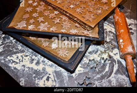 cinnamon stars, cookies flat layed on a baking sheet, ready to be baked for Christmas Stock Photo