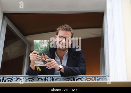 French writer Nicolas Mathieu poses with his book 'Leurs enfants apres eux' after winning the Prix Goncourt, France's top literary prize, on November 7, 2018 in Paris, France. Photo by Nasser Berzane/ABACAPRESS.COM Stock Photo