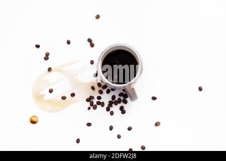 Cup and coffee stain on white background Stock Photo