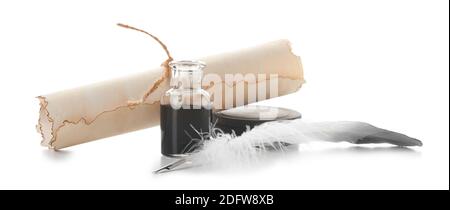 Feather pen with scroll and inkwell on white background Stock Photo