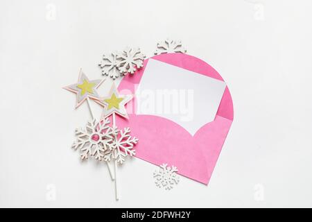 Beautiful Christmas composition with blank card and envelope on white background Stock Photo