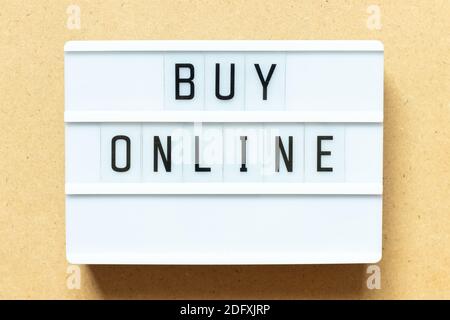 Lightbox with word buy online on wood background Stock Photo