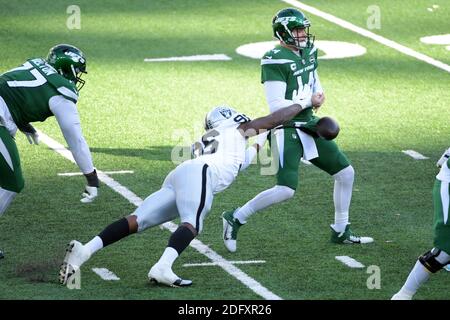 Las Vegas Raiders defensive end Clelin Ferrell (96) forces a fumble by New York Jets quarterback Sam Darnold (14) during the NFL game at MetLife Stadium. The Raiders defeated the Jets 31-28. (Errol Anderson/Image of Sport) Stock Photo