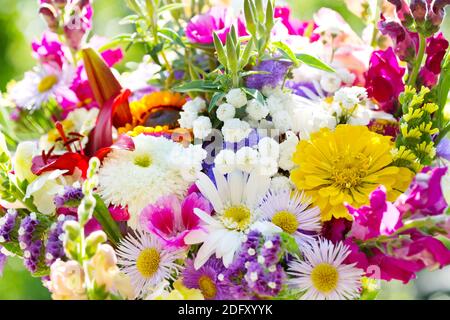 bouquet of summer flowers on green background Stock Photo