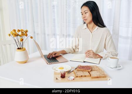 Businesswoman working from home Stock Photo